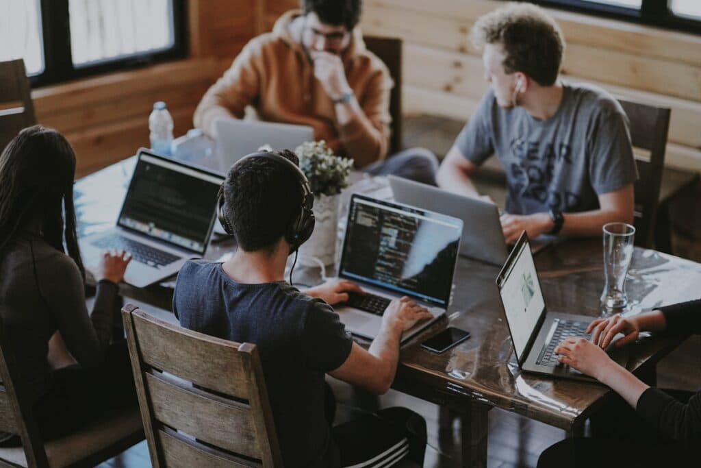 A hiring team reviewing candidates together